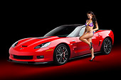 WMN 03 BK0003 01
2013 Chevrolet Corvette ZR1 Red 3/4 Front View In Studio With Swimsuit Model
