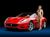 WMN 03 RK0320 01
2009 Ferrari California Red 3/4 Front View Studio With Swimsuit Model