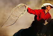 WRG 01 RK0231 09
Close-Up Of Wrangler Riding On Horse Holding Rope