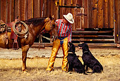 WRG 02 RK0081 08
Wrangler Burt Standing With Two Dogs And Horse By Barn