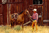 WRG 02 RK0082 08
Wrangler Burt Standing With Horse By Barn